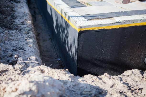 Professional Waterproofing technician working in Dumont, NJ